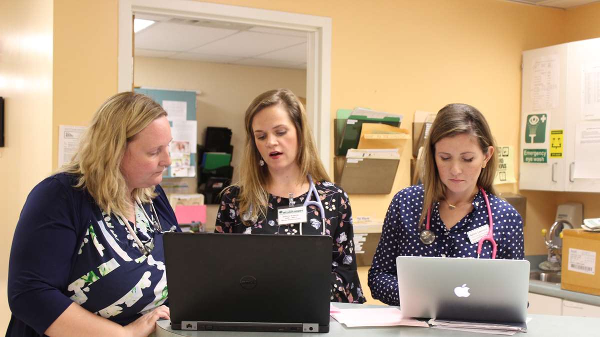Kendra Barker with preceptor and student.